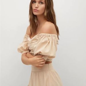 Like New- Worn once. Off shoulder puff sleeve top.
